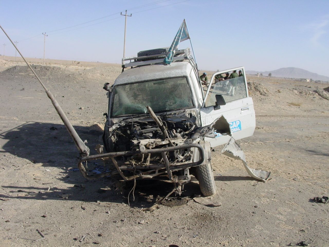 A vehicle from the organization Handicap International which was destroyed by an antivehicle mine in Afghanistan in 2003. Photo © Handicap International.